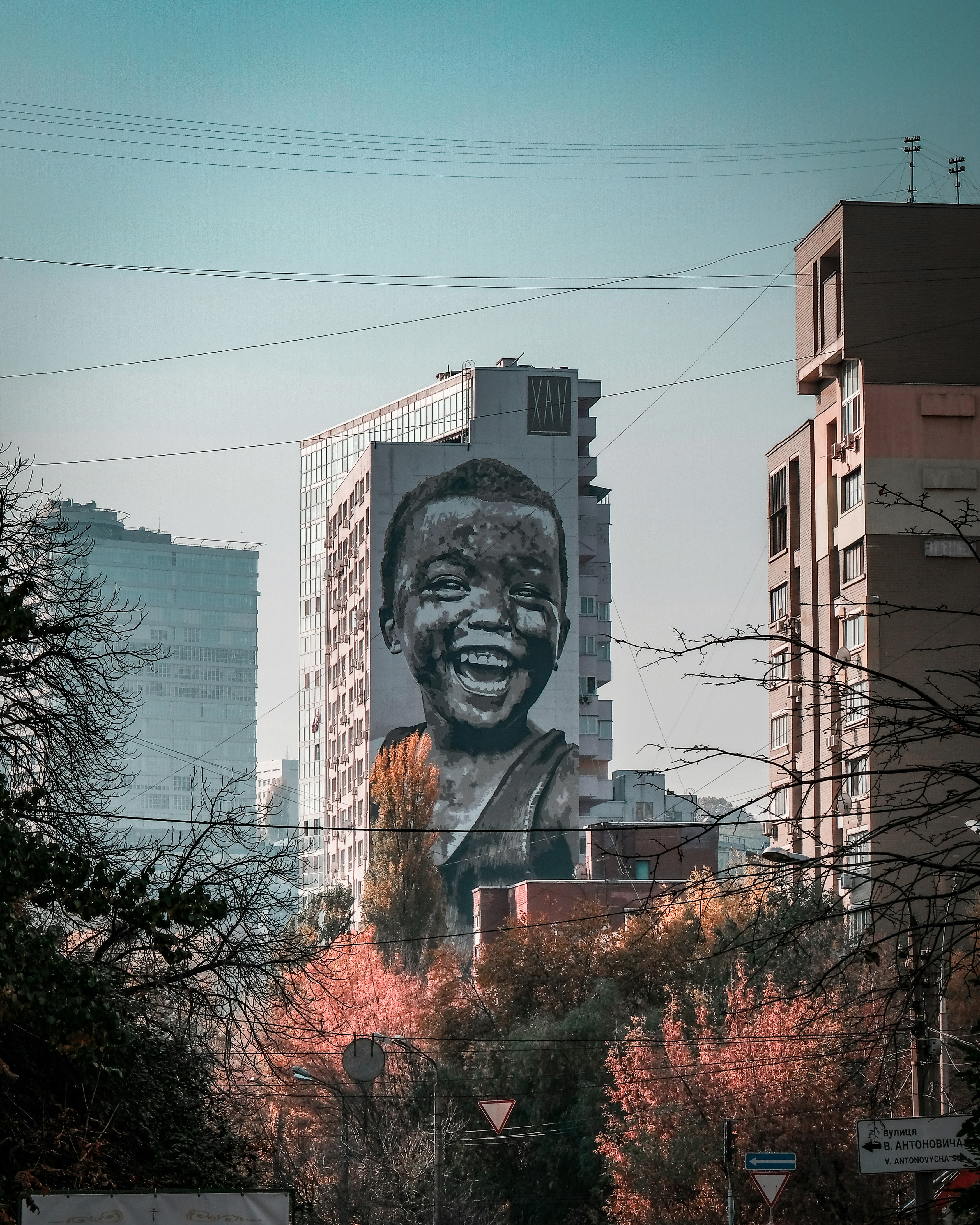 boy face poster on building